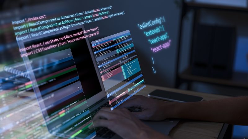 programming-background-with-person-working-with-codes-computer (3)